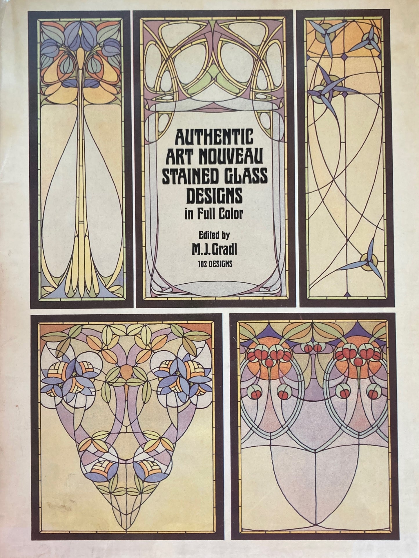 Authentic Art Nouveau Stained Glass Designs in Full Color 　Dover